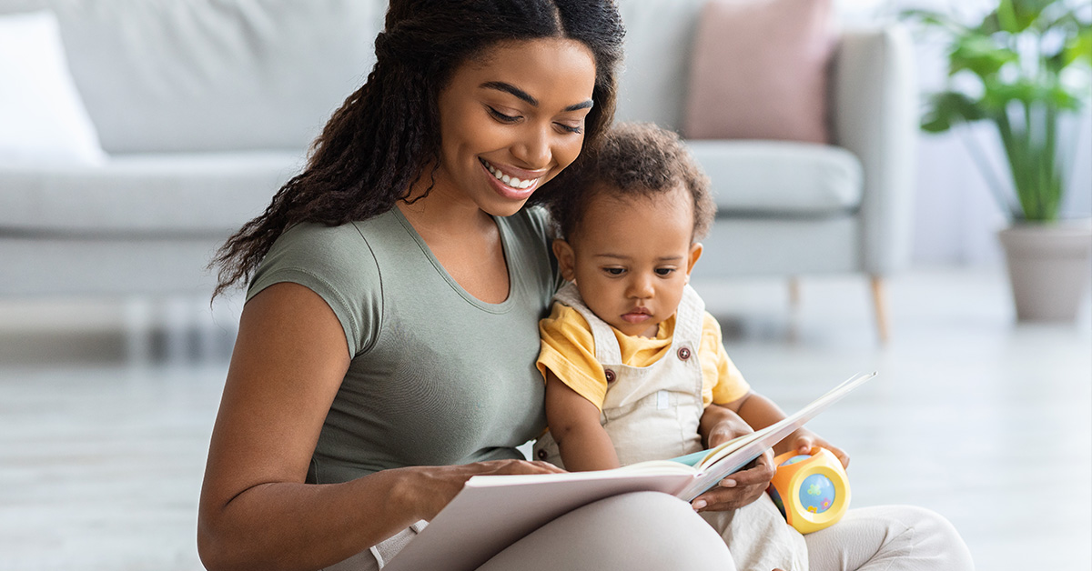 mother reading to her infant